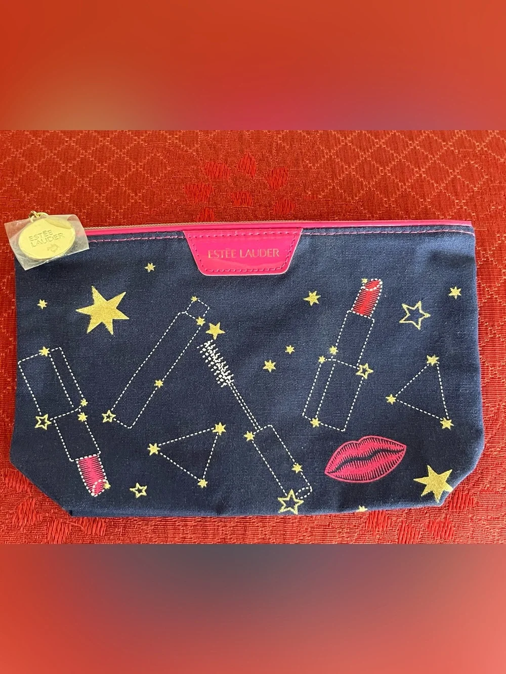 Estee Lauder Navy Cosmetic Pouch with Pink Trim and Yellow Star Print